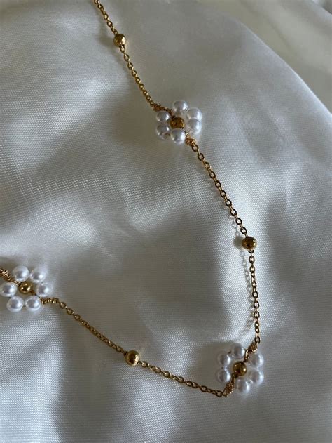 collana chanel con margherite thun|Collane .